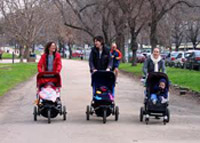 Women walking with strollers
