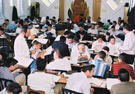Yeshiva boys learning in their Beis Medrash