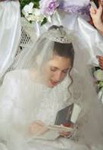 The bride praying before the wedding