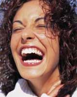 A woman enjoying a joke