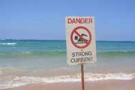 A beach warning sign