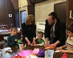 Kids having a craft activity at the shul